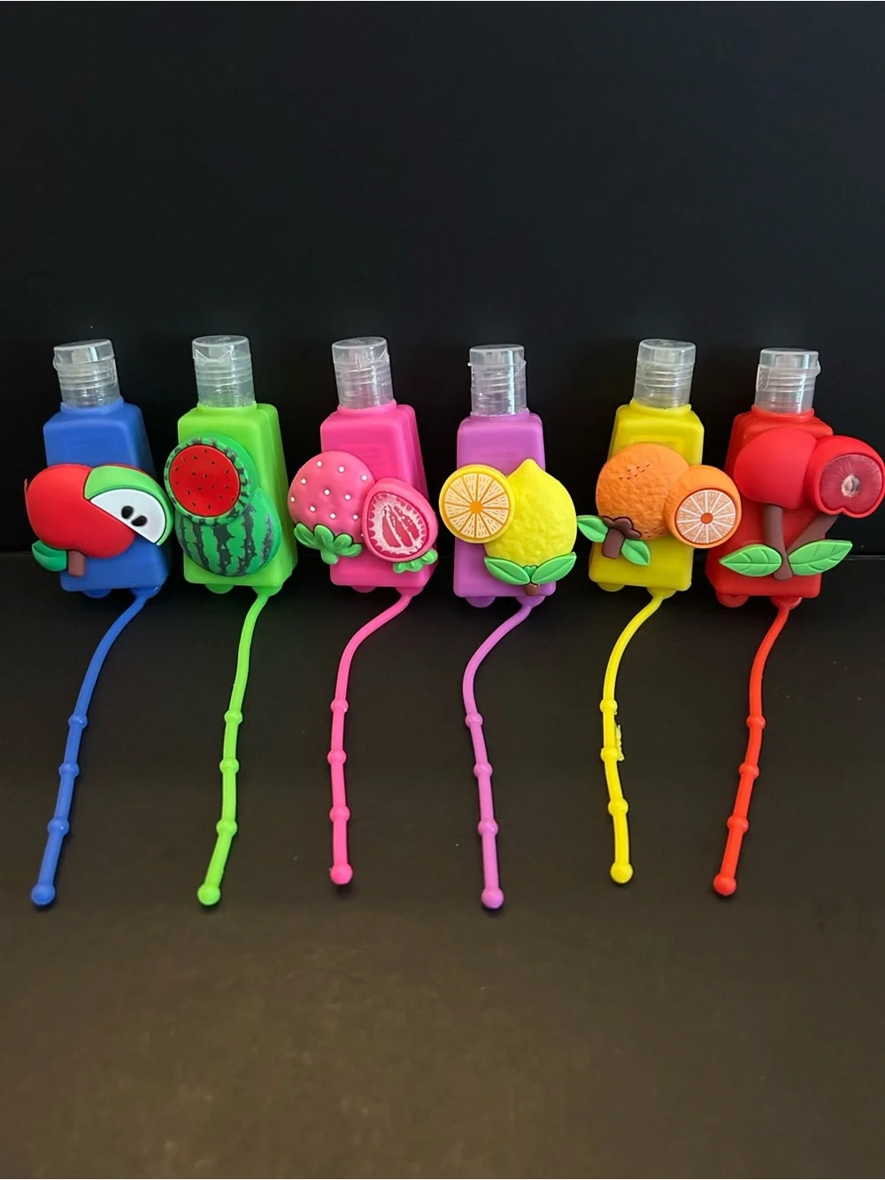 Kids Assortment of (6) Fruit Themed Scented Hand Sanitizer Gel in Silicone Cases